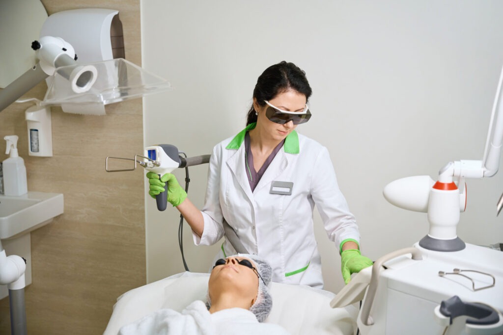 specialist dermatologist sets up a modern laser de 2025 03 10 04 22 08 utc