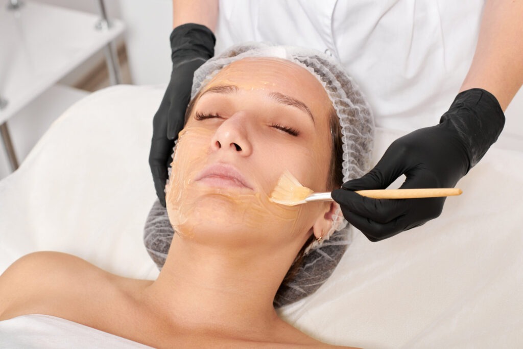 beautician applies honey mask on woman face for mo 2025 03 14 00 19 44 utc